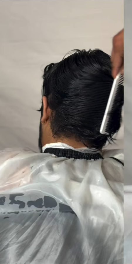 Before: uncut hair being combed